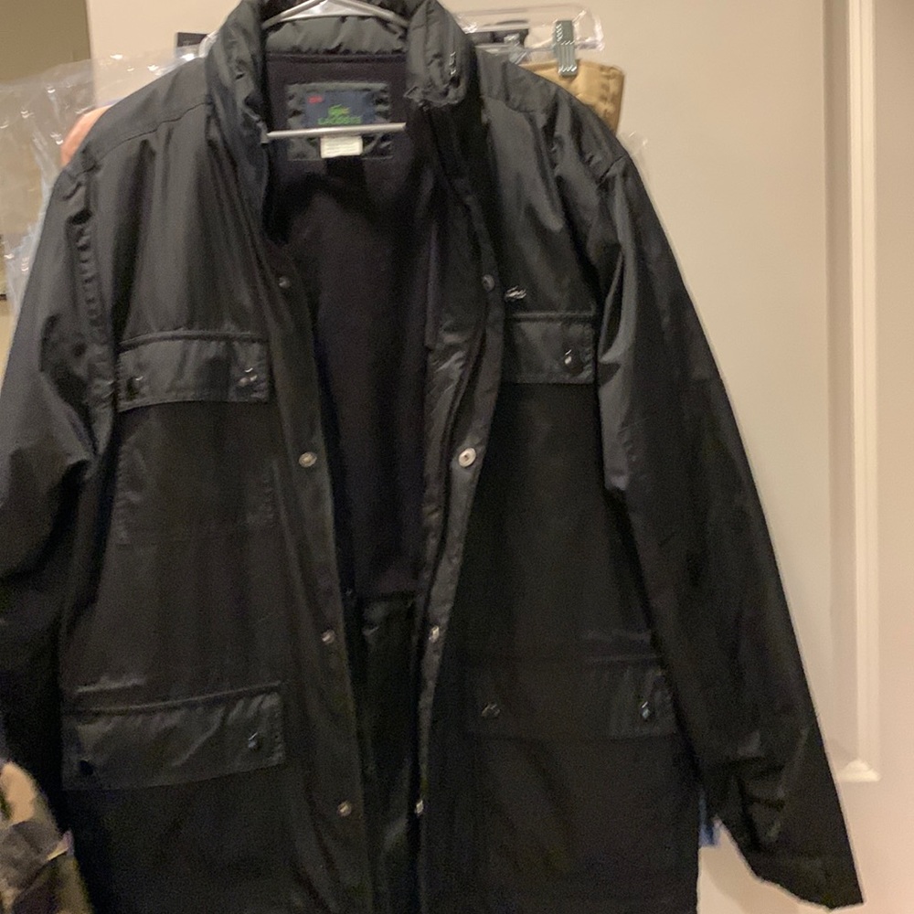 Coat with hoodie black I-zod Lacoste XL pockets on outside and inside like new